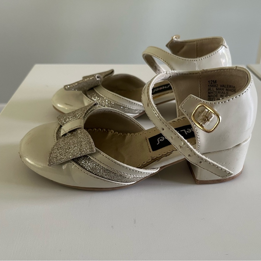 Tan girls dress shoes. Worn once or twice. Size 12
